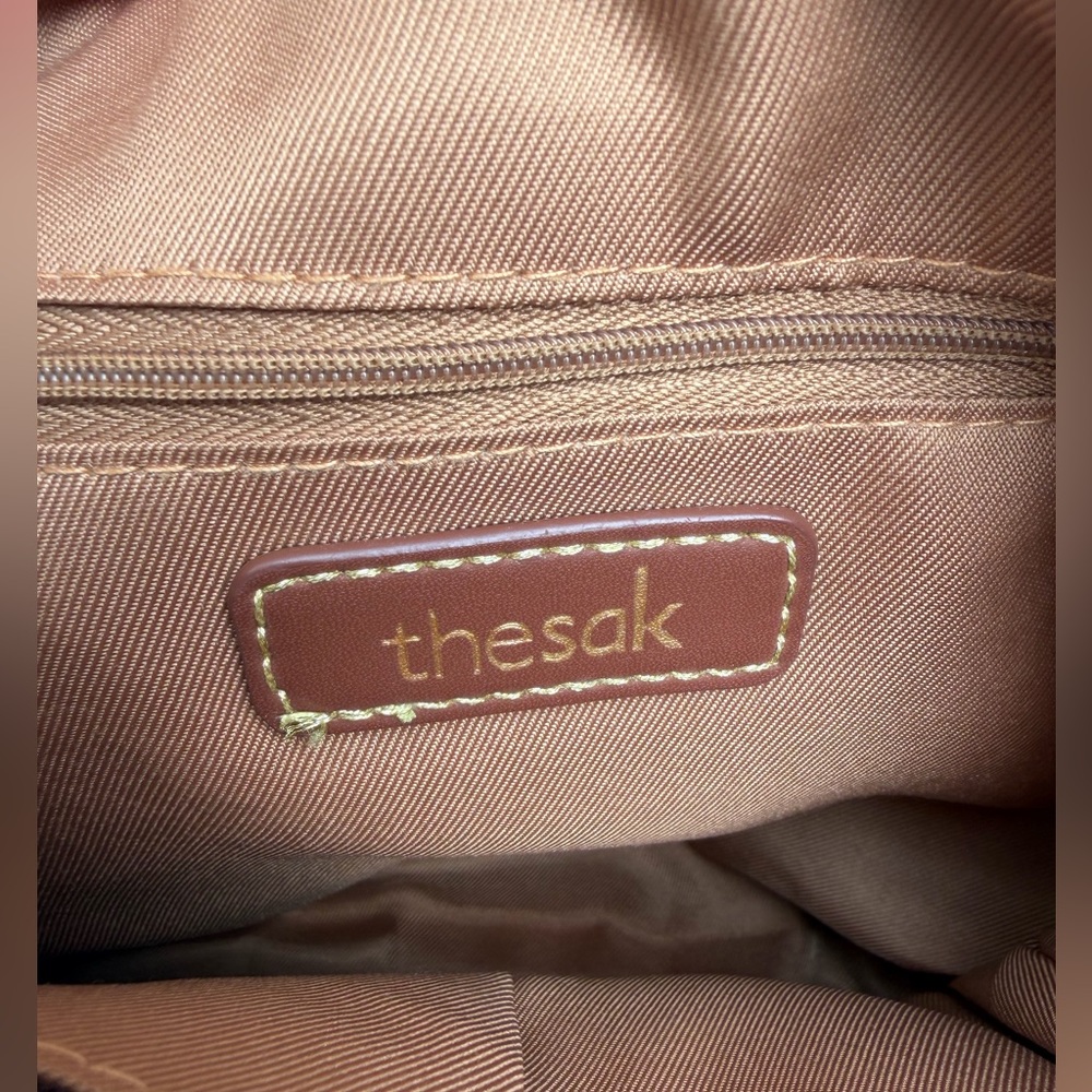 The Sak Silverlake Crossbody Bag in the Tobacco Floral Emboss color. - Picture 2 of 5